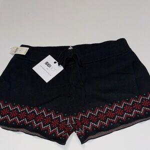 Beach Riot Black Sweater Shorts with Red and Green Design